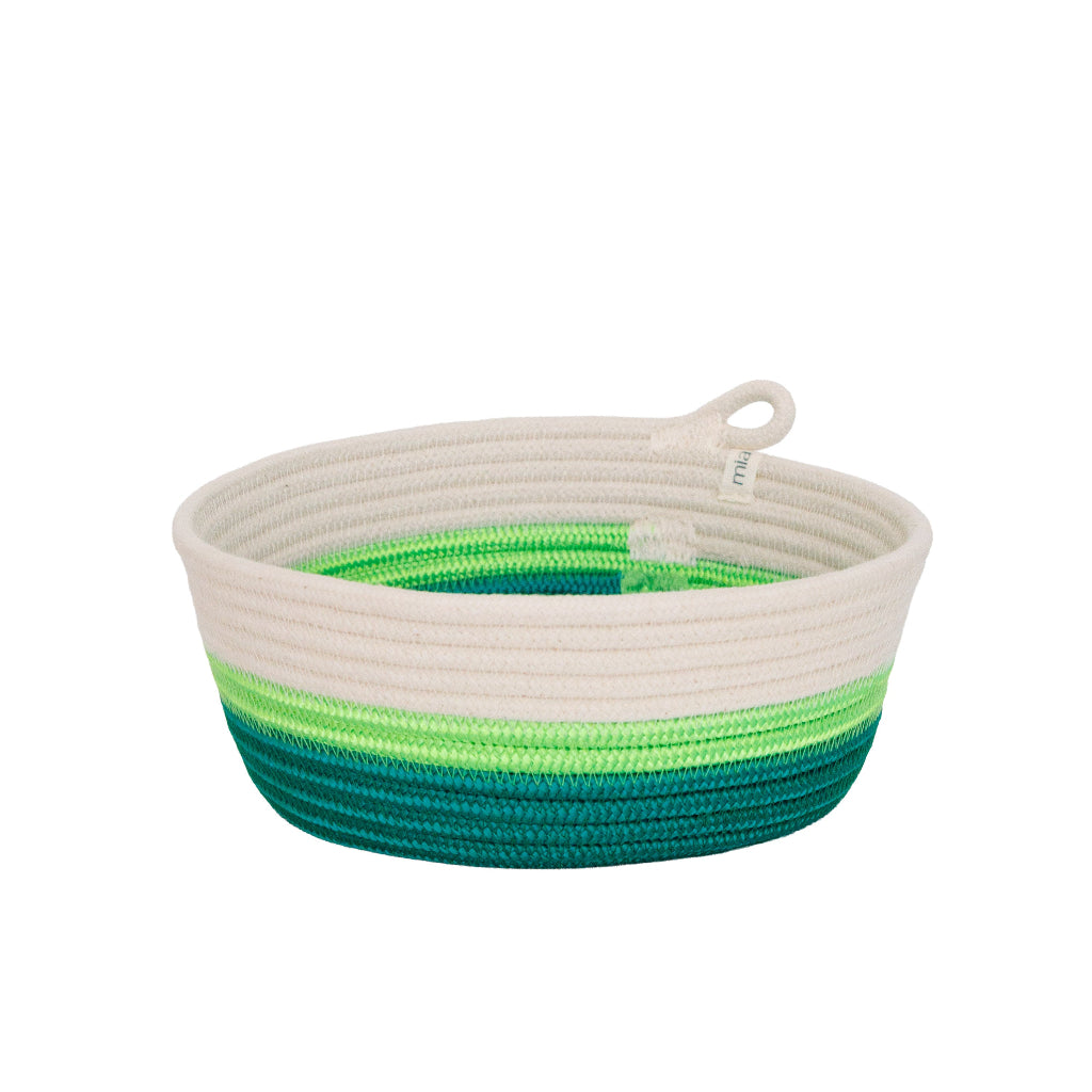 Rope basket with green and blue stripes on a white background